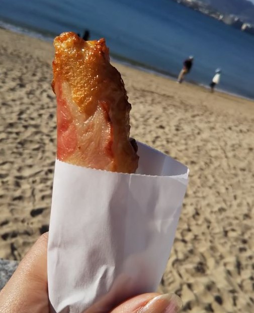 Japanese nigiri-ten (deep-fried fish cake with cheese and bacon)